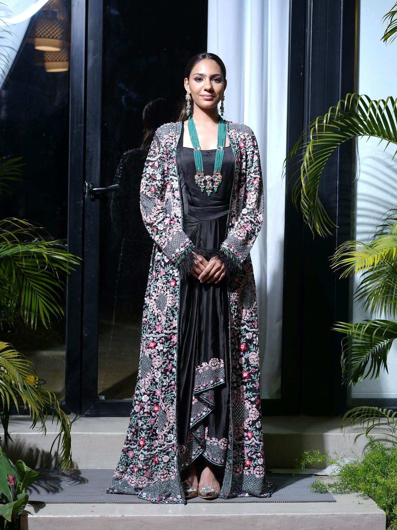 A model showcasing Jacket And Drape Skirt Set Feature image by Farha Syed from Farha Syed's collection