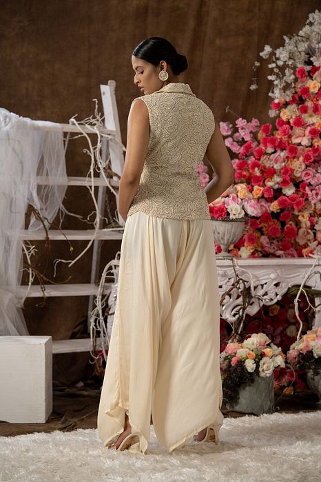 A model showcasing Jacket And Dhoti Pant Set by Farha Syed from Farha Syed's collection