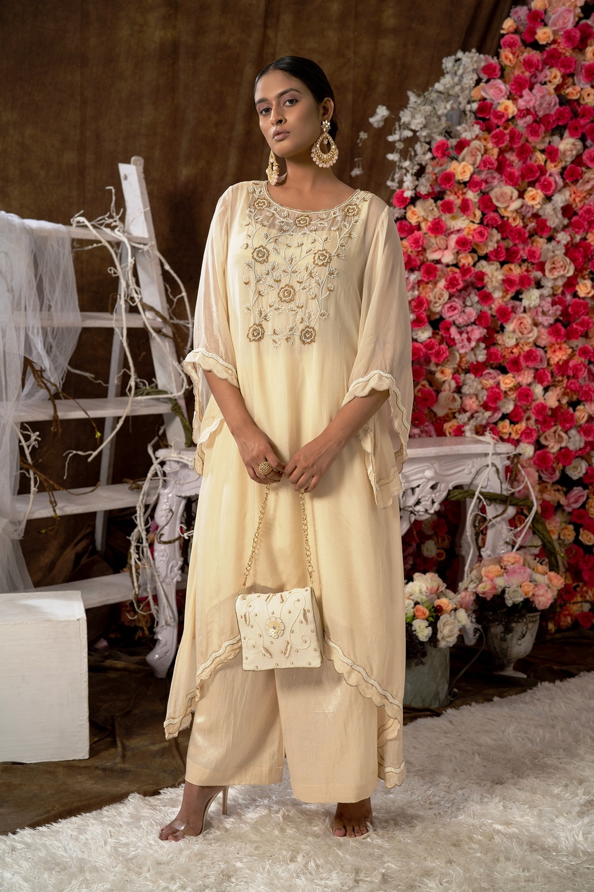A model showcasing Ivory Kurta Set Feature image by Farha Syed from Farha Syed's collection