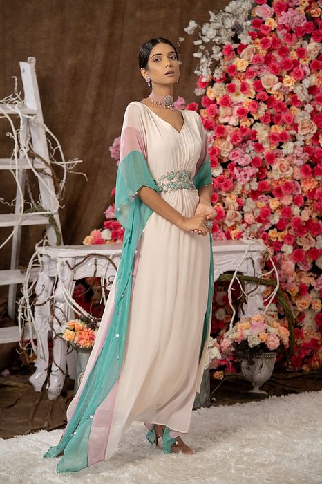 A model showcasing Long One Piece Kaftan by Farha Syed from Farha Syed's collection