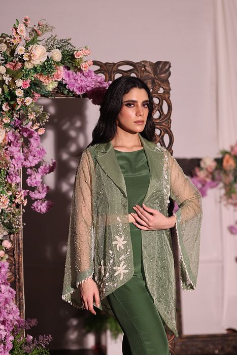 A model showcasing Green Jacket And Pant Set by Ayushi Agarwal from Ayushi Agarwal's collection