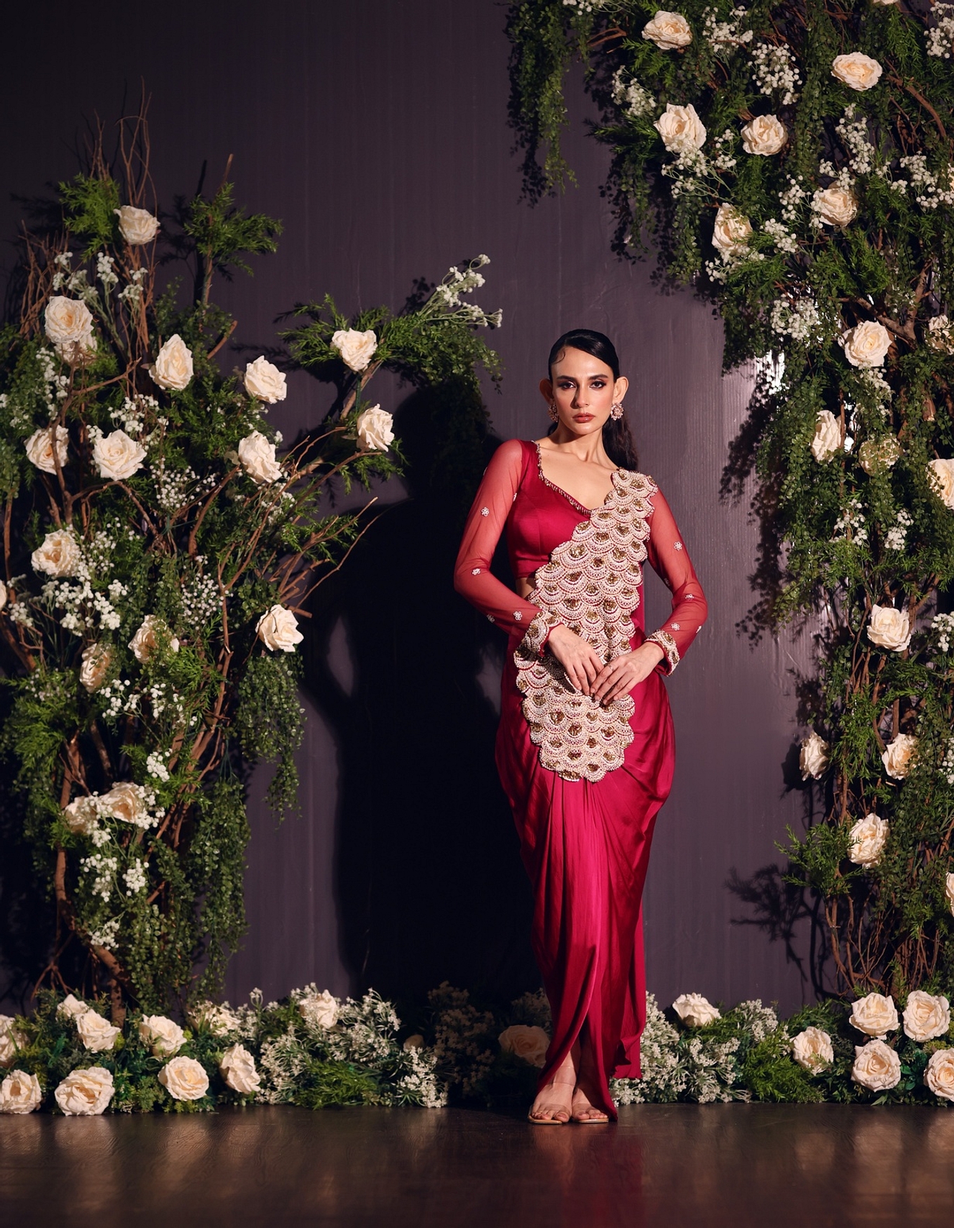 A model showcasing Fuschia Red Drape Saree Feature image by Ayushi Agarwal from Ayushi Agarwal's collection