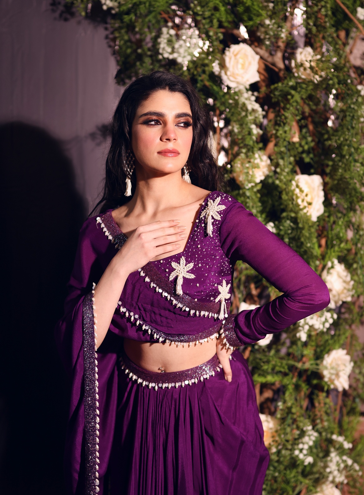 A model showcasing Purple Drape Skirt Set by Ayushi Agarwal from Ayushi Agarwal's collection