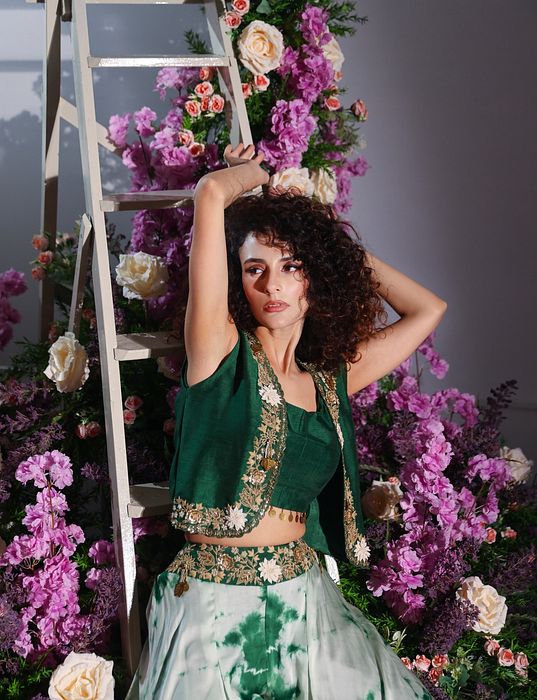 A model showcasing Green Jacket And Plazzo Pant Set by Ayushi Agarwal from Ayushi Agarwal's collection