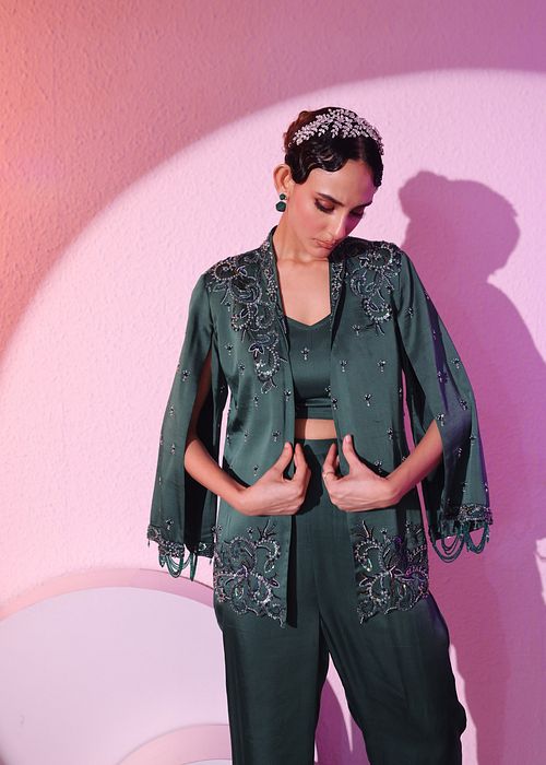 A model showcasing Green Blazer And Pant Set by Ayushi Agarwal from Ayushi Agarwal's collection