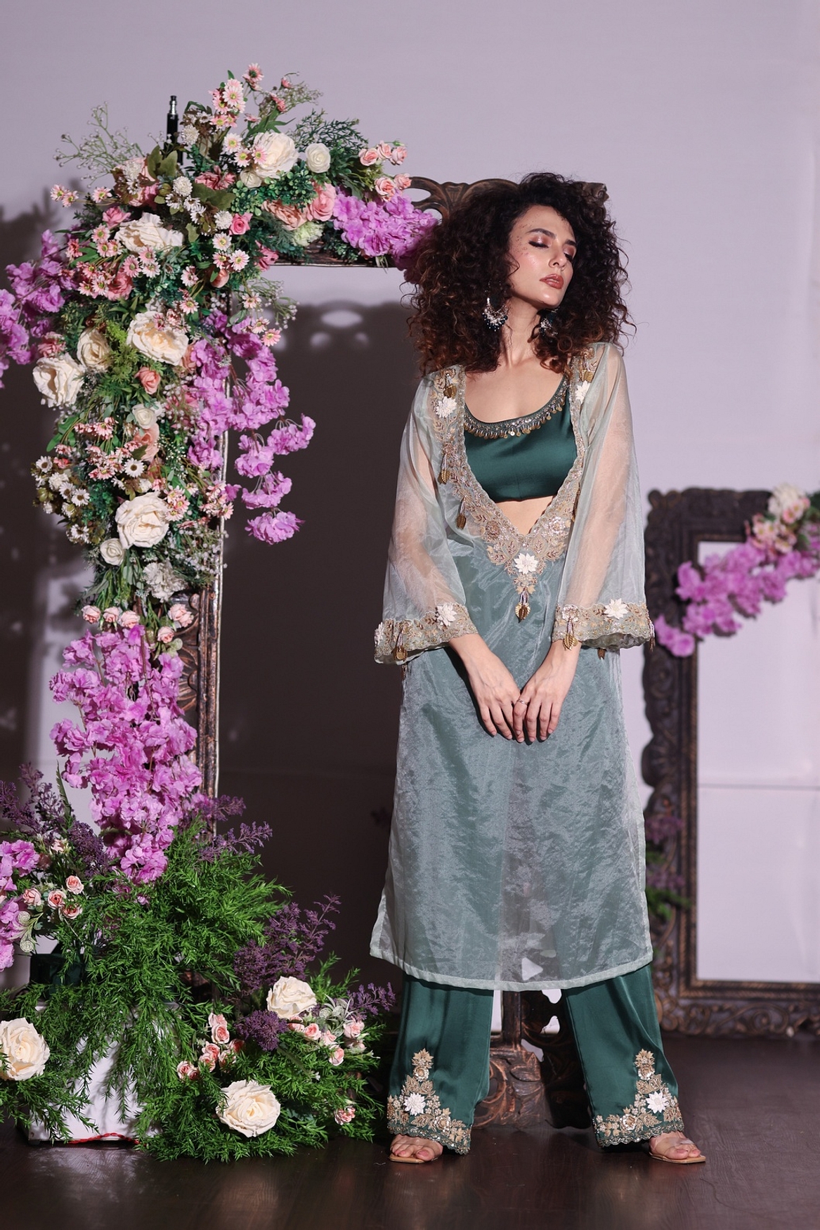 A model showcasing Bottle Green Pant Set With Kurta Feature image by Ayushi Agarwal from Ayushi Agarwal's collection