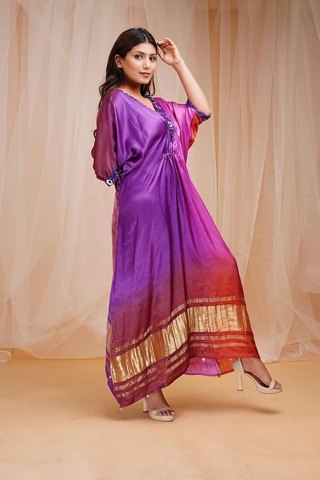 A model showcasing Violet Pink And Rust Red Shaded Kaftaan by Farha Syed from Farha Syed's collection A model showcasing Violet Pink And Rust Red Shaded Kaftaan by Farha Syed from Farha Syed's collection