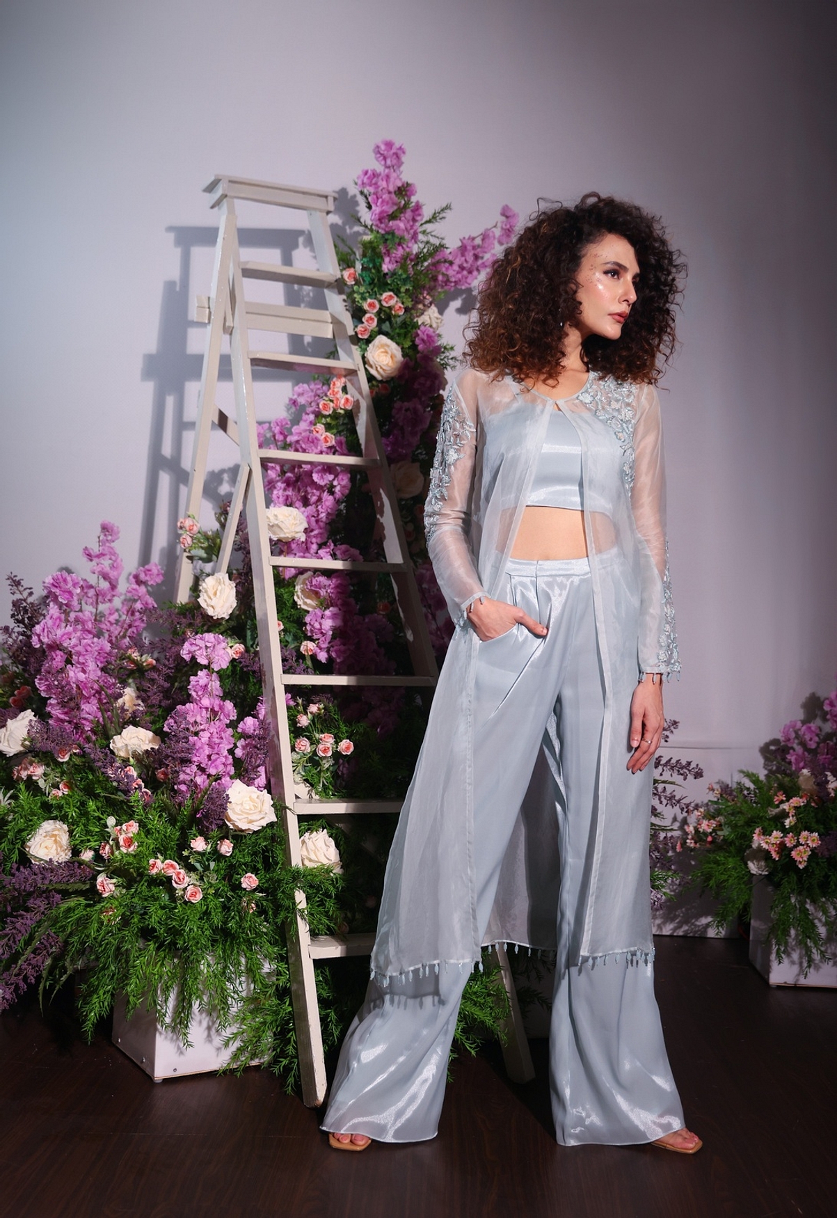 A model showcasing Blue Pant And Jacket Set Feature image by Ayushi Agarwal from Ayushi Agarwal's collection