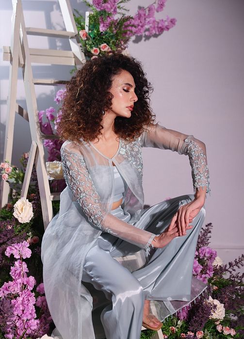 A model showcasing Blue Pant And Jacket Set by Ayushi Agarwal from Ayushi Agarwal's collection