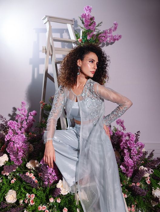 A model showcasing Blue Pant And Jacket Set by Ayushi Agarwal from Ayushi Agarwal's collection