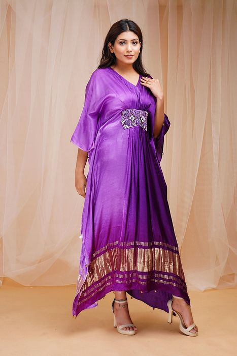 A model showcasing Heliotrope Purple Violet Shaded Kaftaan by Farha Syed from Farha Syed's collection A model showcasing Heliotrope Purple Violet Shaded Kaftaan by Farha Syed from Farha Syed's collection