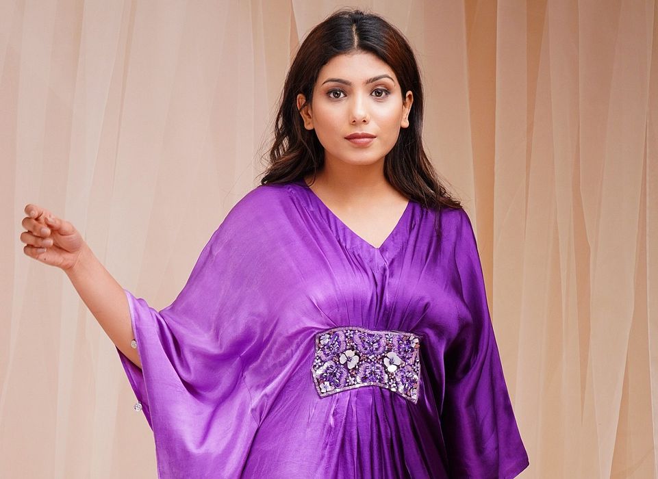 A model showcasing Heliotrope Purple Violet Shaded Kaftaan by Farha Syed from Farha Syed's collection A model showcasing Heliotrope Purple Violet Shaded Kaftaan by Farha Syed from Farha Syed's collection
