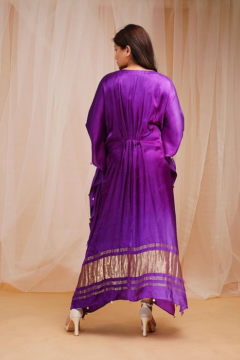 A model showcasing Heliotrope Purple Violet Shaded Kaftaan by Farha Syed from Farha Syed's collection A model showcasing Heliotrope Purple Violet Shaded Kaftaan by Farha Syed from Farha Syed's collection