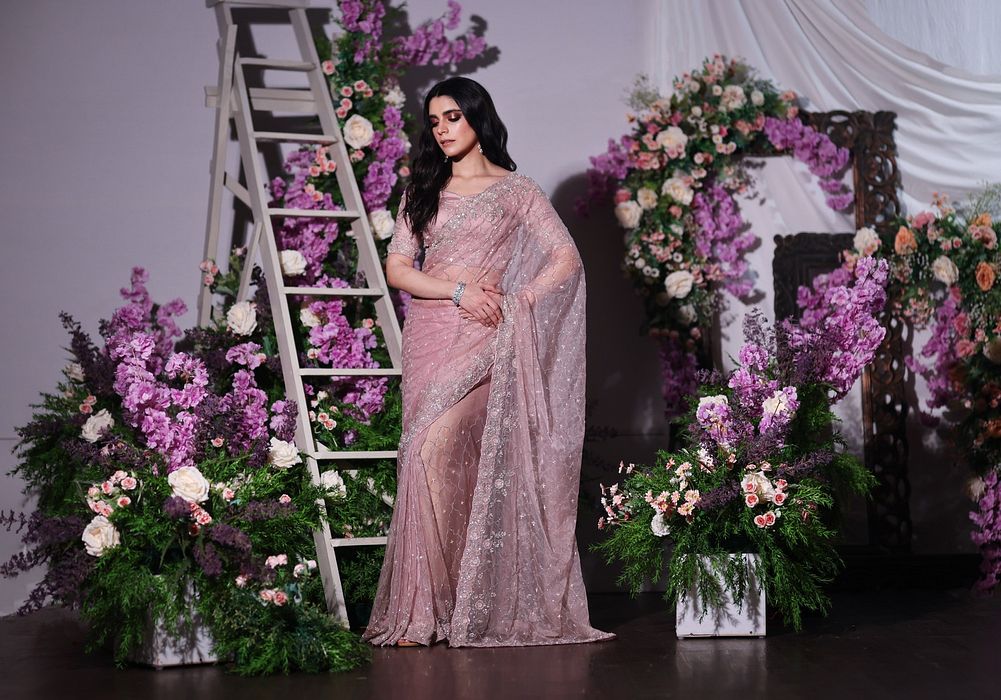A model showcasing Lavender Organza Saree by Ayushi Agarwal from Ayushi Agarwal's collection