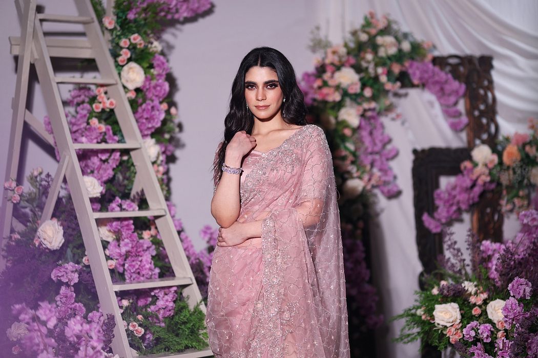 A model showcasing Lavender Organza Saree by Ayushi Agarwal from Ayushi Agarwal's collection
