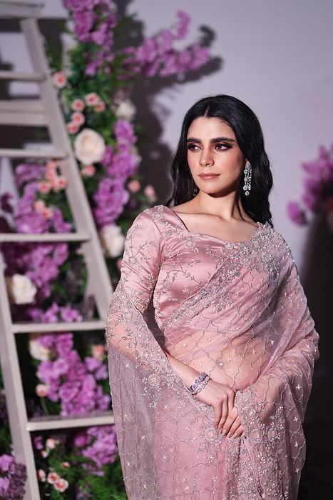 A model showcasing Lavender Organza Saree by Ayushi Agarwal from Ayushi Agarwal's collection