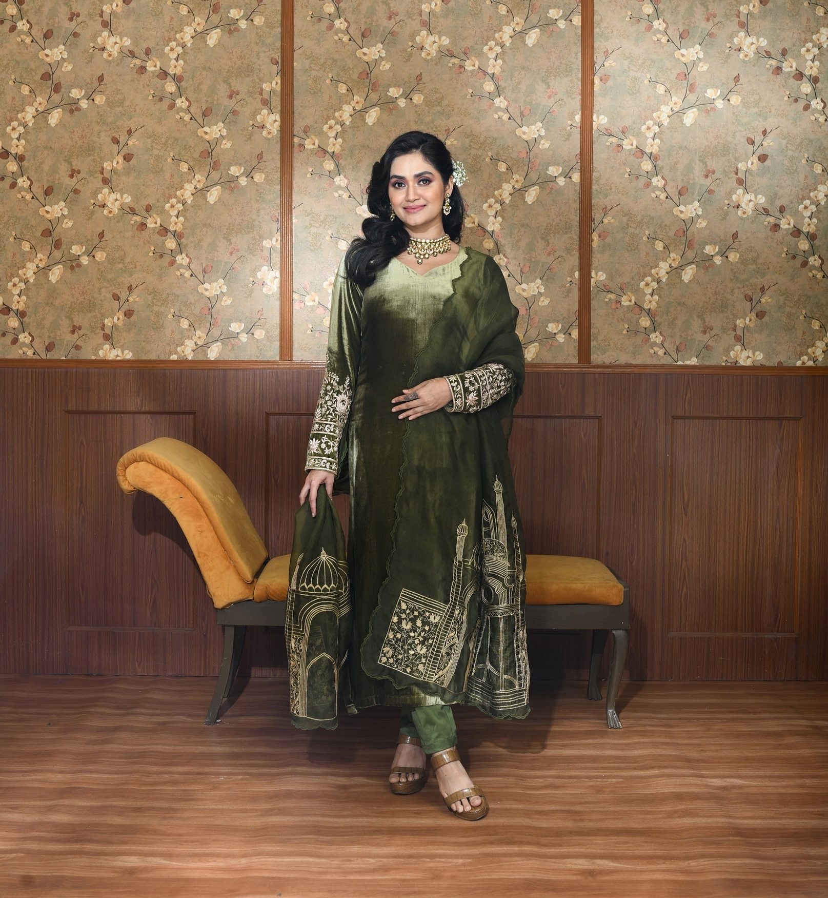 A model showcasing Green Inara Velvet Suit Set Feature image by Ayushi Agarwal from Ayushi Agarwal's collection