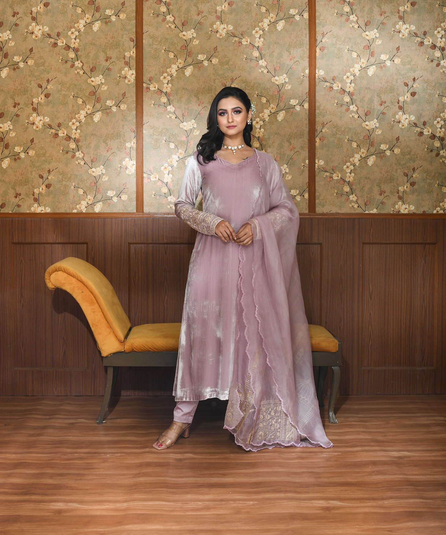 A model showcasing Pink Inara Velvet Suit Set Feature image by Ayushi Agarwal from Ayushi Agarwal's collection