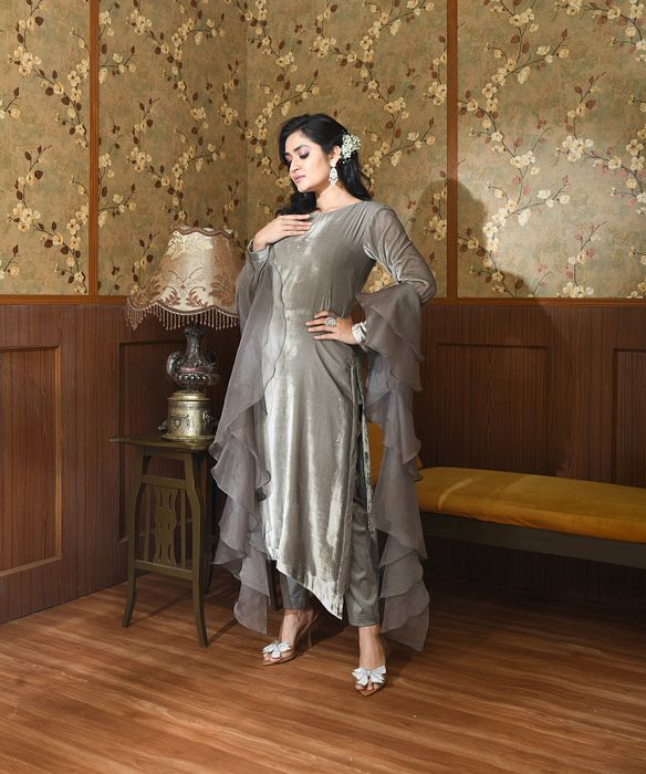 A model showcasing Grey Liora Suit Set by Ayushi Agarwal from Ayushi Agarwal's collection