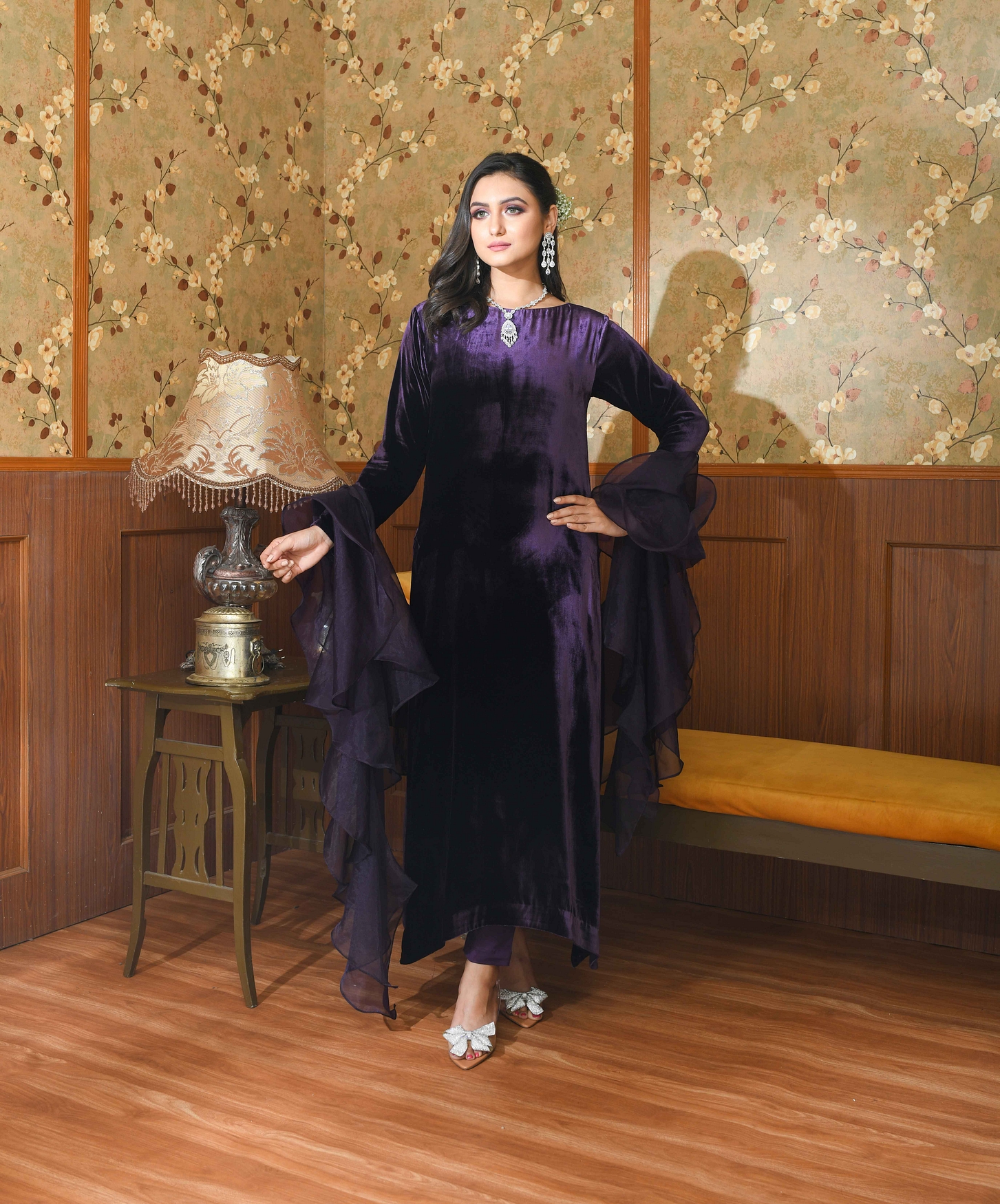 A model showcasing Purple Liora Velvet Suit Set Feature image by Ayushi Agarwal from Ayushi Agarwal's collection