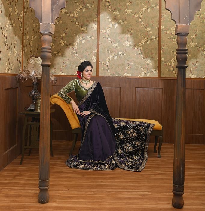 A model showcasing Adira Green And Purple Saree Set by Ayushi Agarwal from Ayushi Agarwal's collection