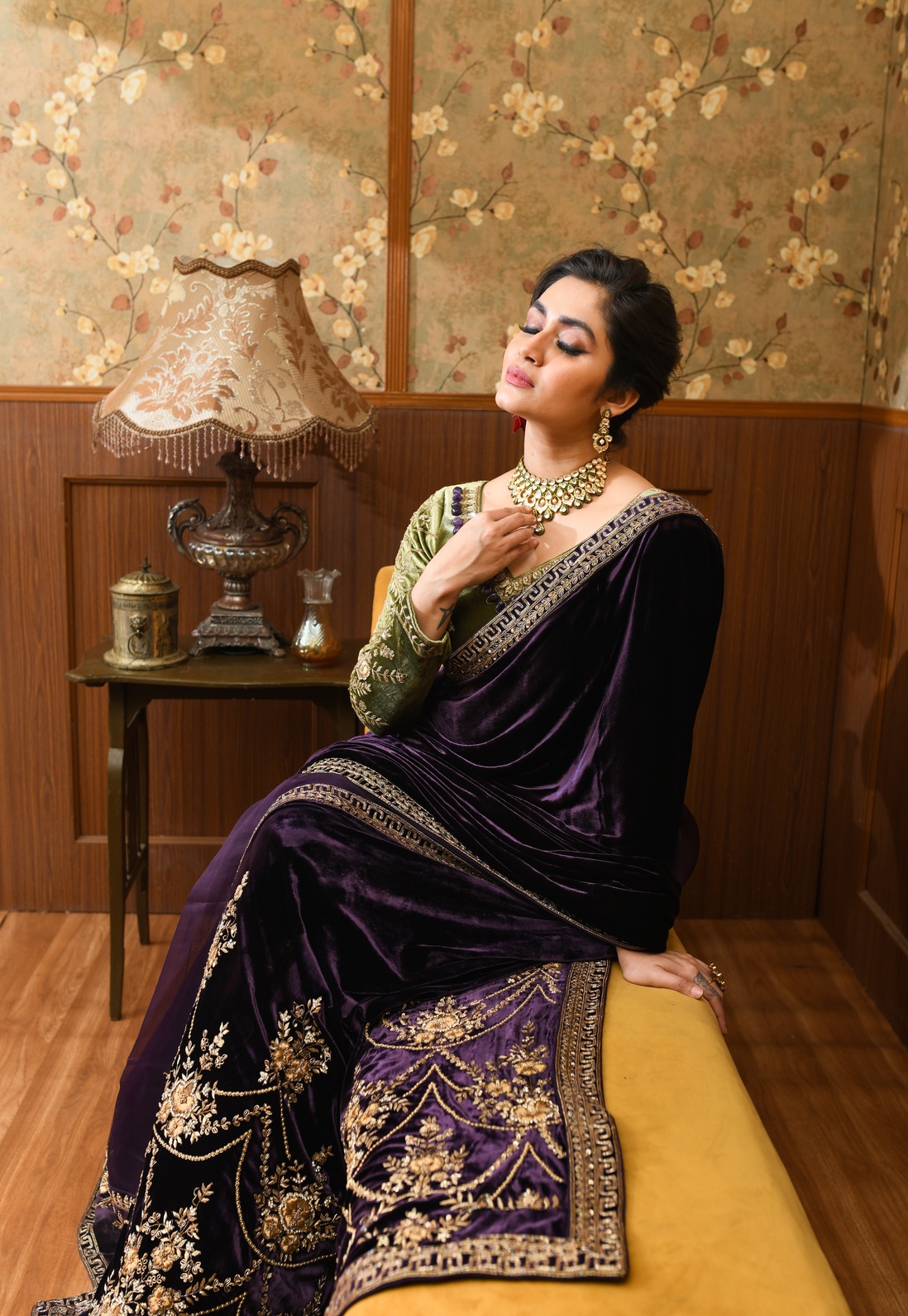 A model showcasing Adira Green And Purple Saree Set by Ayushi Agarwal from Ayushi Agarwal's collection