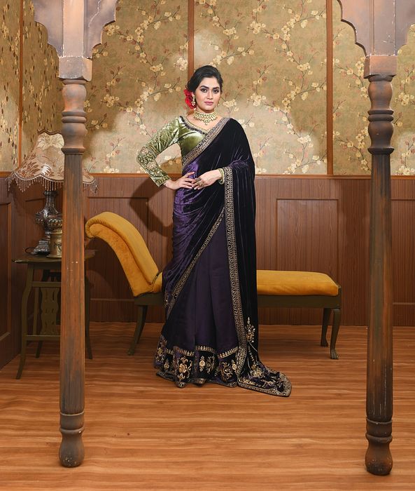 A model showcasing Adira Green And Purple Saree Set by Ayushi Agarwal from Ayushi Agarwal's collection