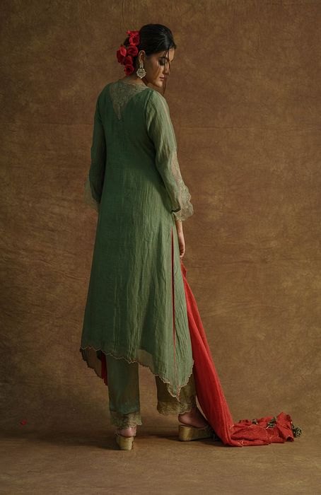 A model showcasing Olive Green Kurta Set And Palazzo Set With Dupatta by Farha Syed from Farha Syed's collection