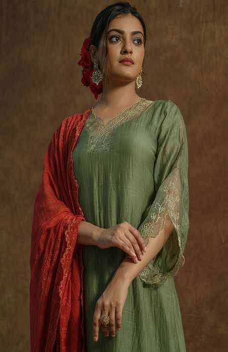 A model showcasing Olive Green Kurta Set And Palazzo Set With Dupatta by Farha Syed from Farha Syed's collection