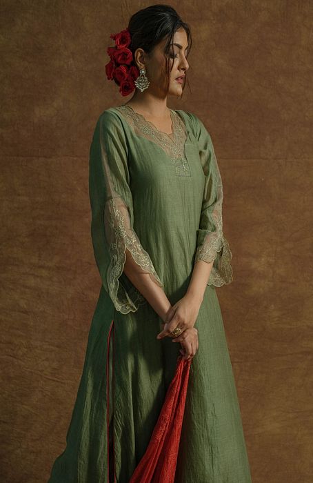 A model showcasing Olive Green Kurta Set And Palazzo Set With Dupatta by Farha Syed from Farha Syed's collection