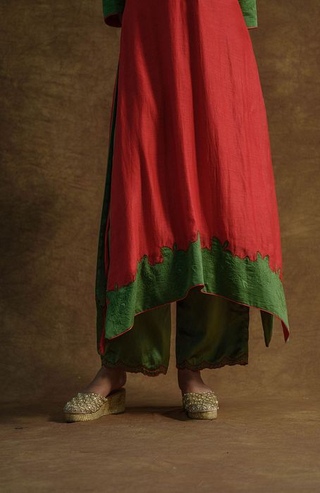 A model showcasing Red Kurta Set With Palazzo Pants And Dupatta by Farha Syed from Farha Syed's collection