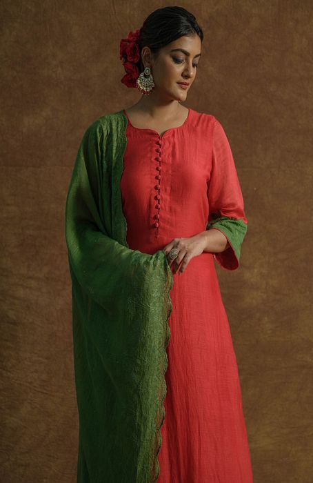 A model showcasing Red Kurta Set With Palazzo Pants And Dupatta by Farha Syed from Farha Syed's collection
