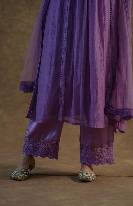 A model showcasing Iris Purple Kurta Set With Palazza And Dupatta by Farha Syed from Farha Syed's collection