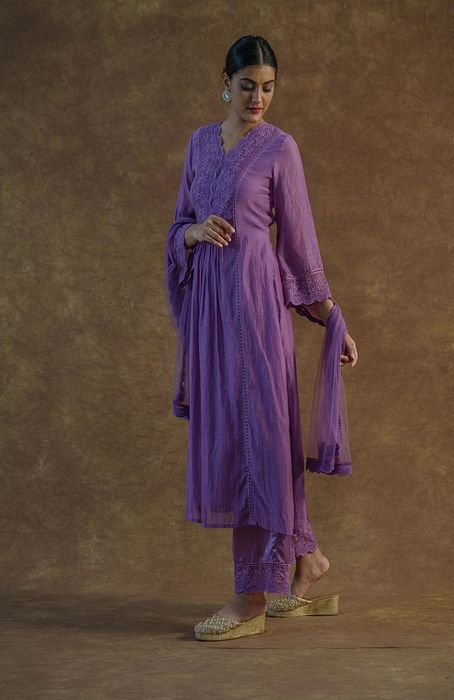 A model showcasing Iris Purple Kurta Set With Palazza And Dupatta by Farha Syed from Farha Syed's collection