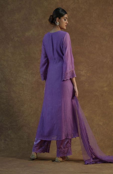 A model showcasing Iris Purple Kurta Set With Palazza And Dupatta by Farha Syed from Farha Syed's collection
