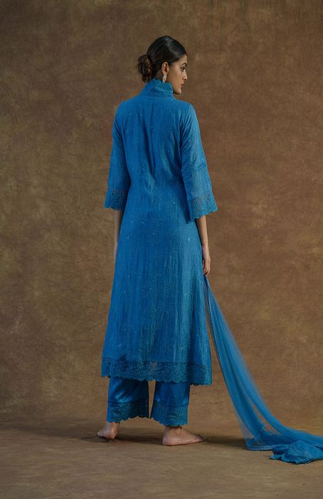A model showcasing Teal Blue Kurta Set With Palazzo And Dupatta by Farha Syed from Farha Syed's collection
