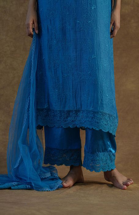 A model showcasing Teal Blue Kurta Set With Palazzo And Dupatta by Farha Syed from Farha Syed's collection