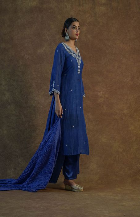 A model showcasing Royal Blue Kurta Set With Palazzo And Dupatta by Farha Syed from Farha Syed's collection