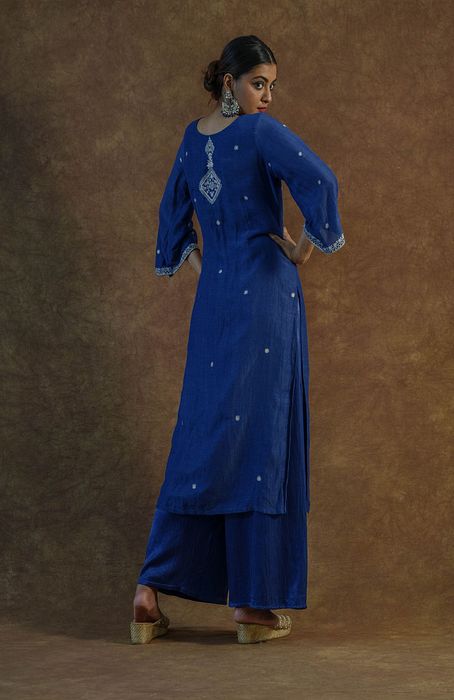 A model showcasing Royal Blue Kurta Set With Palazzo And Dupatta by Farha Syed from Farha Syed's collection