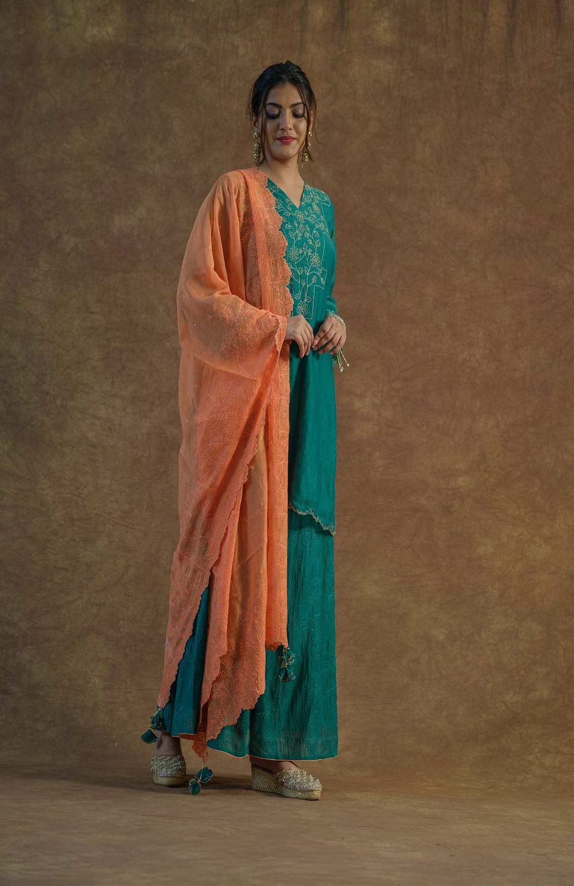 A model showcasing Emerald Green Sharara And Kurta Set Feature image by Farha Syed from Farha Syed's collection
