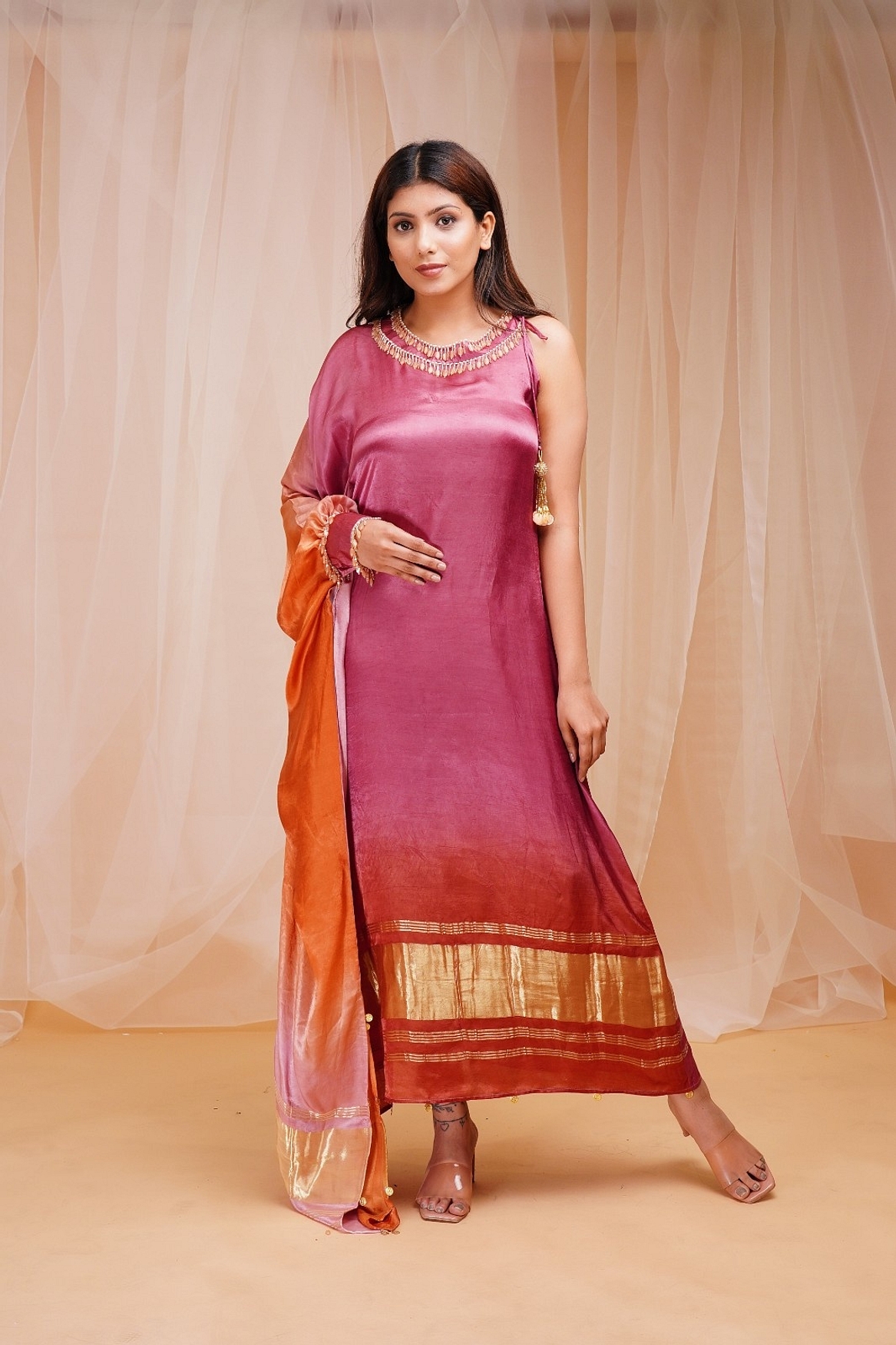 A model showcasing Mulberry Violet Orangutan Orange Shaded Kaftaan Feature image by Farha Syed from Farha Syed's collection