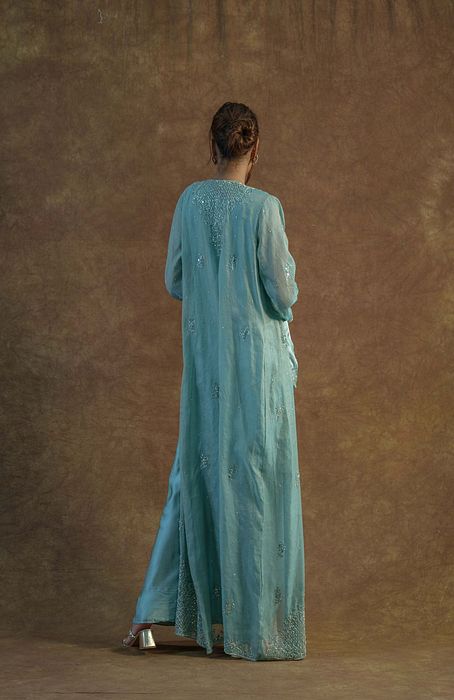 A model showcasing Greyish Green Kurta And Sharara Set by Farha Syed from Farha Syed's collection