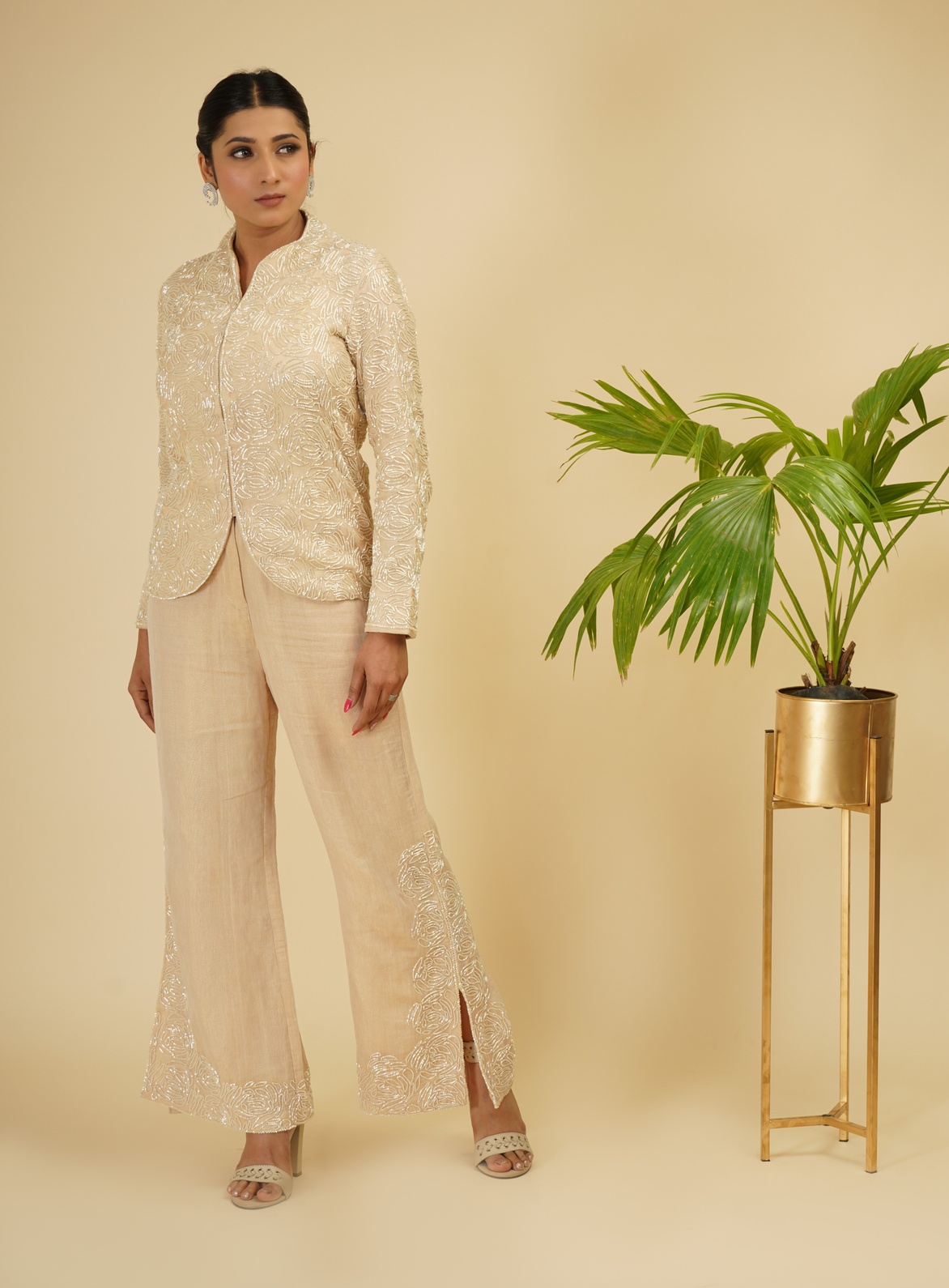 A model showcasing Ivory Gold 2 Piece Embroidered Coord Set Feature image by Farha Syed from Farha Syed's collection