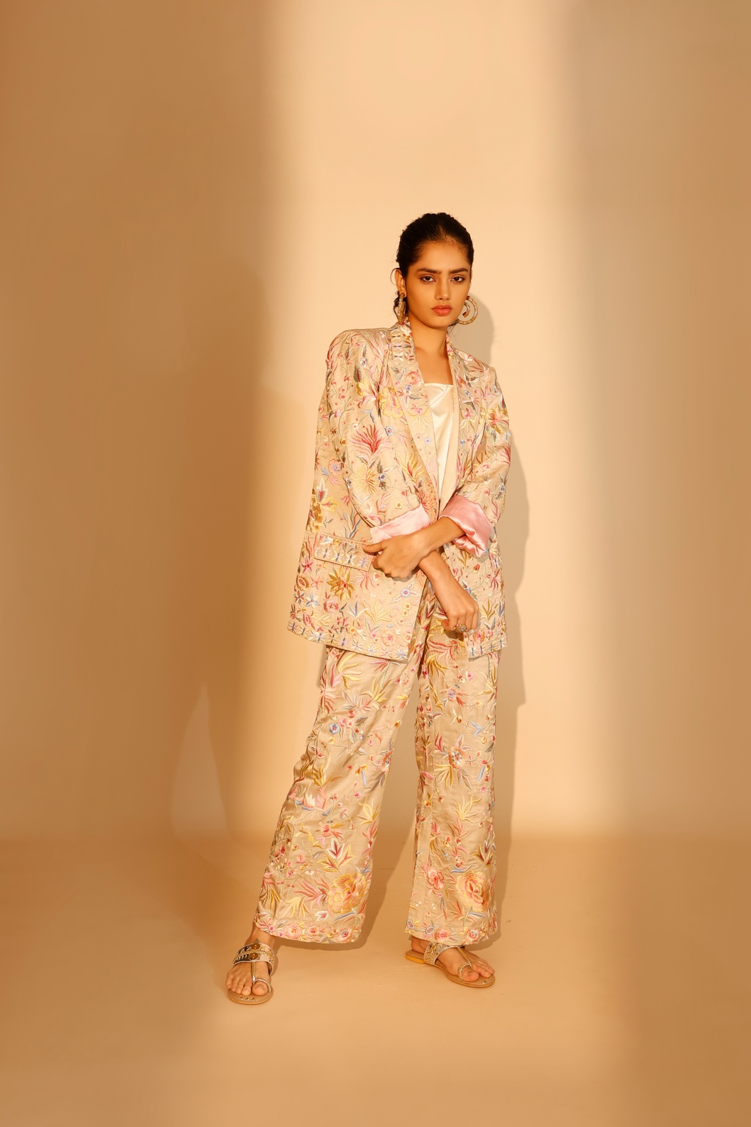 A model showcasing Beige Bloom Blazer Set by Ashtar from Ashtar's collection