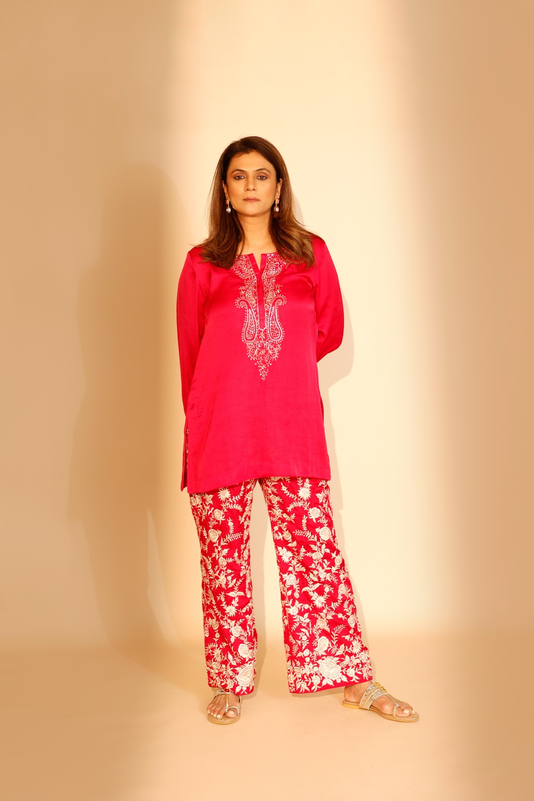 A model showcasing Pink Riva Twin Set by Ashtar from Ashtar's collection