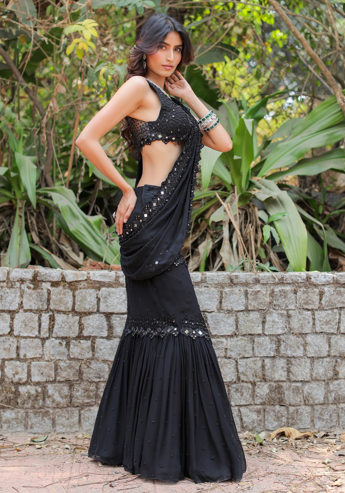 A model showcasing Black Embroidered Mumtaz Saree Set by Foram Patel from Foram Patel's collection