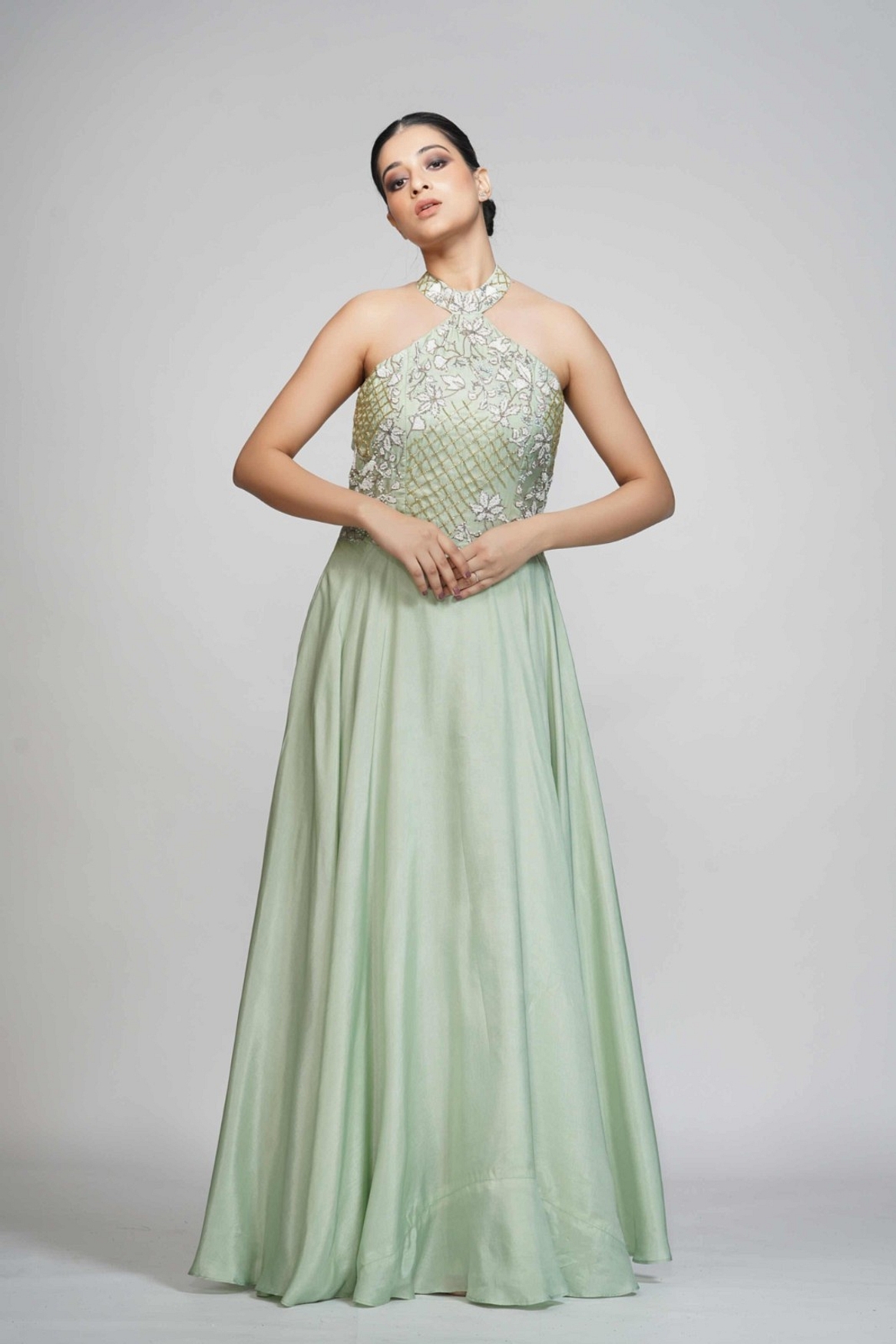 A model showcasing White Embroidery Halter Neck Gown Feature image by Shruti S Label from Shruti S Label's collection