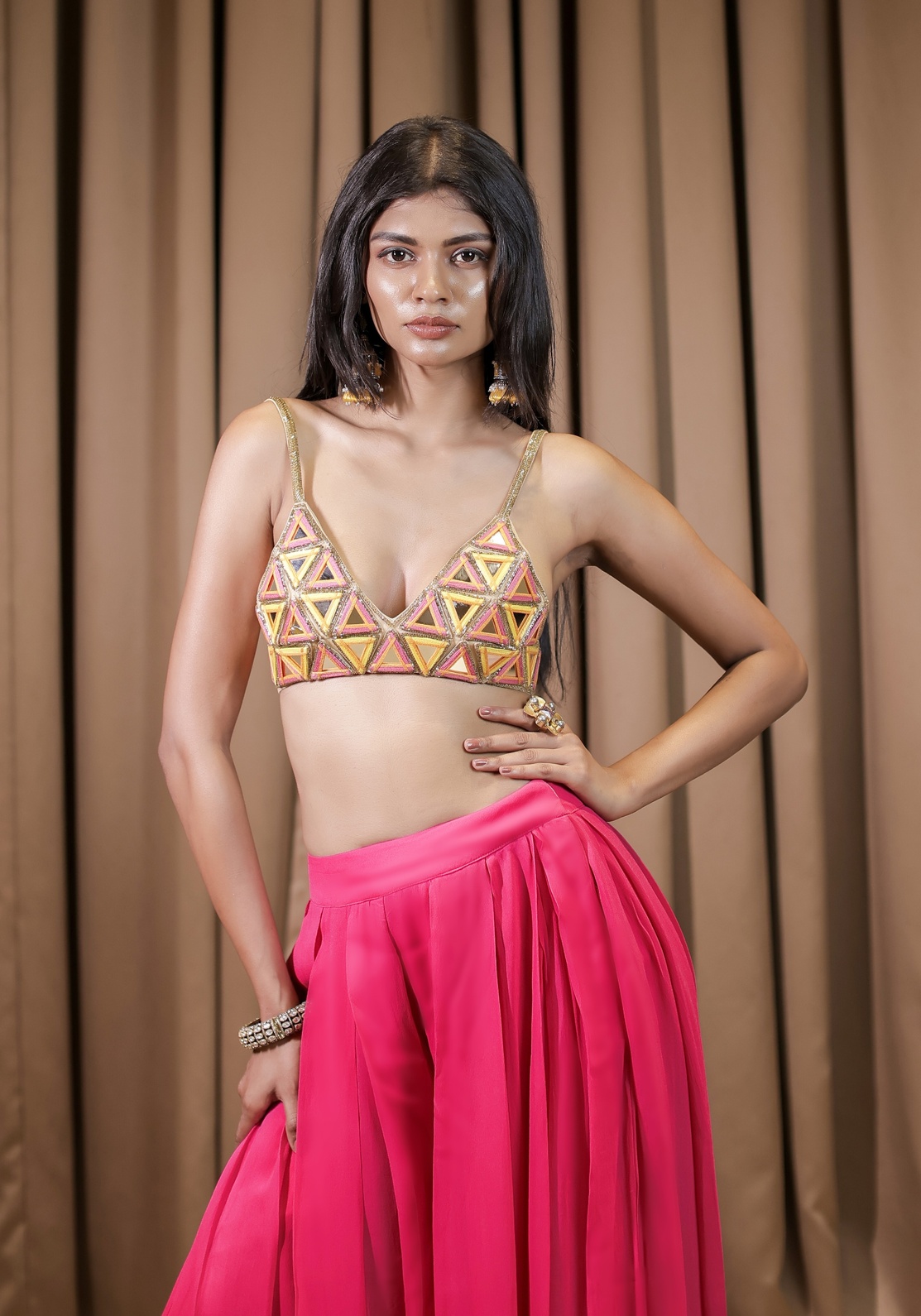 A model showcasing Pink Bralette Pant Set by Foram Patel from Foram Patel's collection