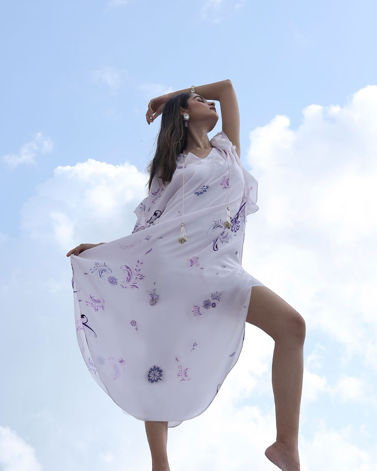 A model showcasing White Printed Kaftan by Foram Patel from Foram Patel's collection