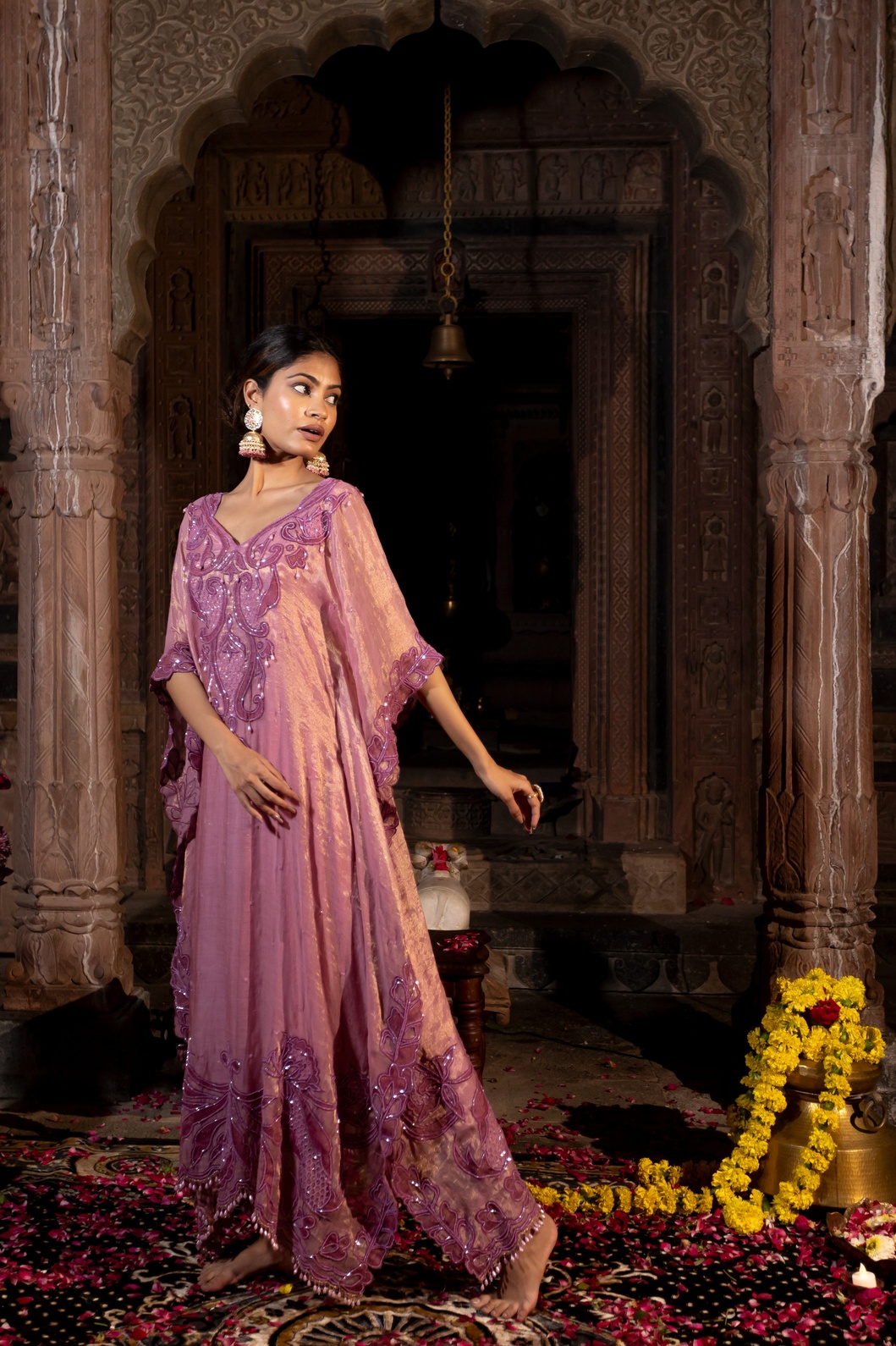 A model showcasing Lavender Pink Kaftaan Set by Farha Syed from Farha Syed's collection